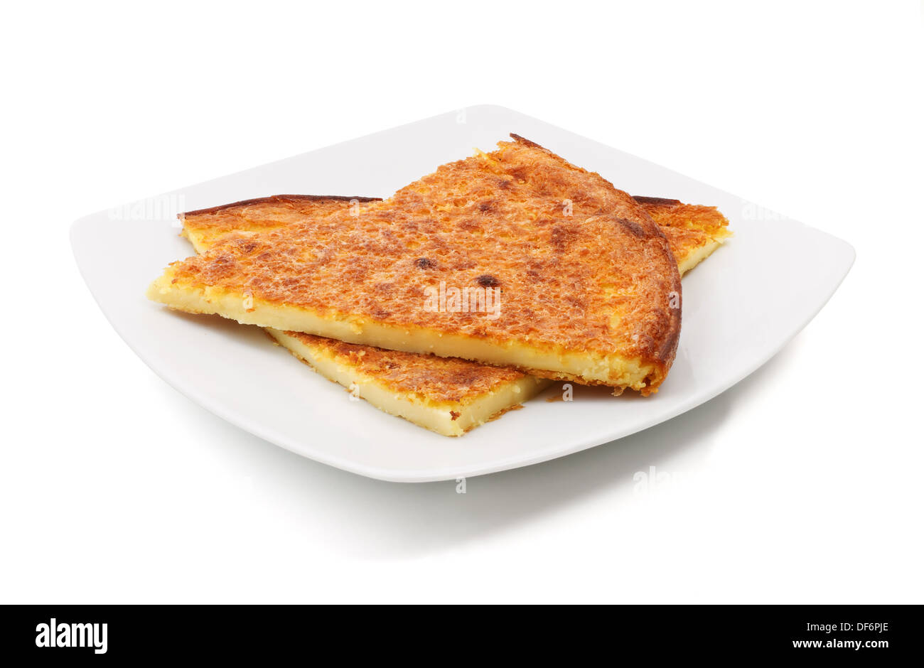 plate with italian farinata baked with chickpea flour over white ...