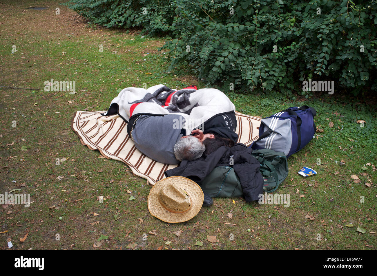 Homeless woman sleeping in park hires stock photography and images Alamy