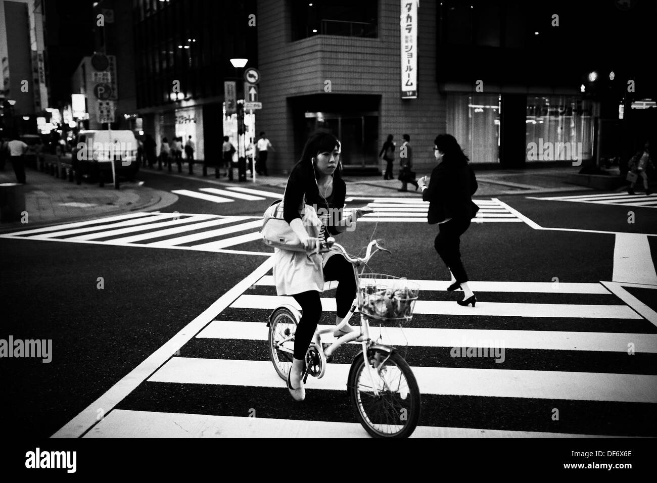 woman on bike Stock Photo