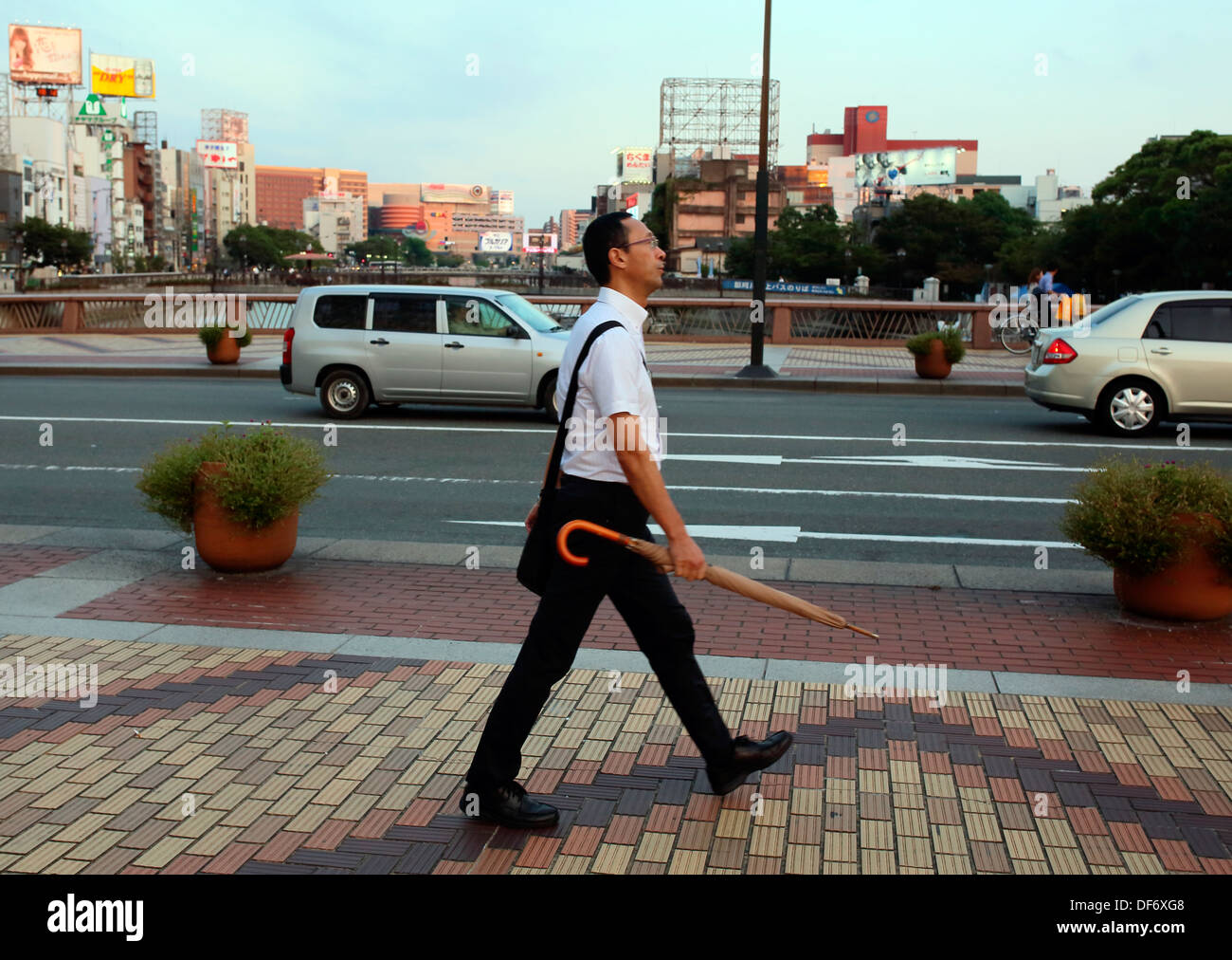 Pedestrian with umbrella hi-res stock photography and images - Alamy