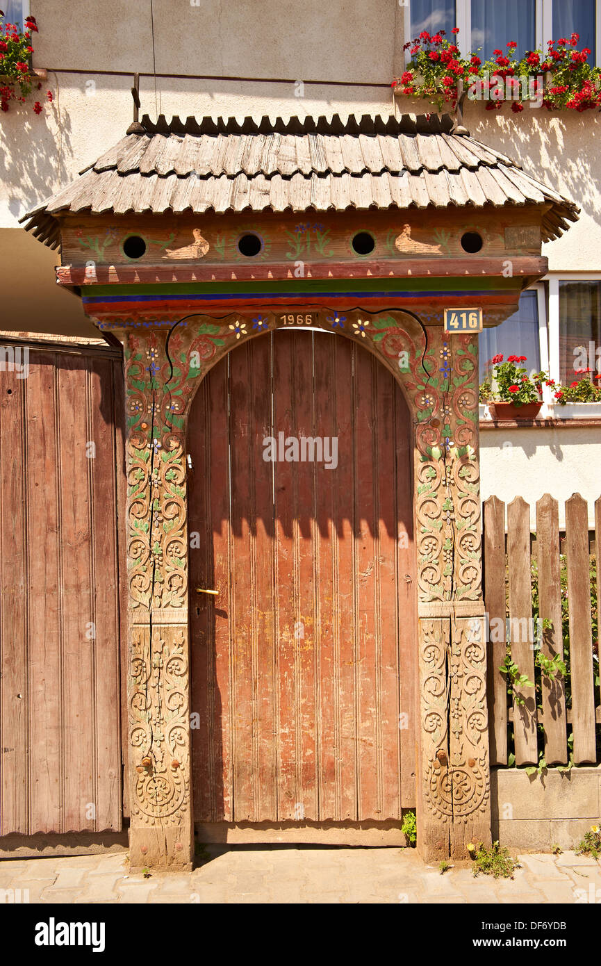 Traditional folk art wooden  Szekely gates in a Szekely village near Cluj, Eastern Transylvania, Szeklerland. Romania Stock Photo