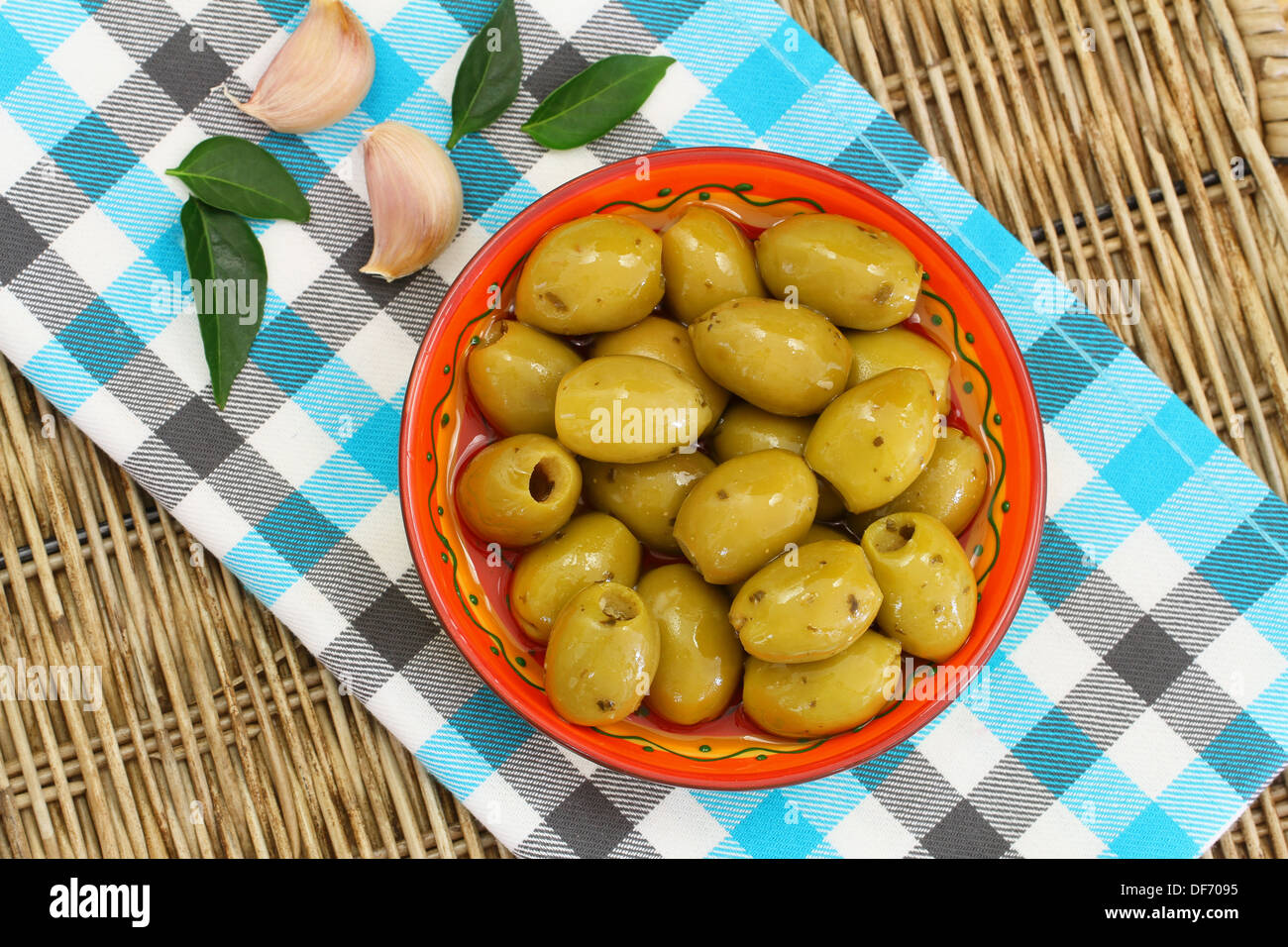 Green olives with garlic Stock Photo