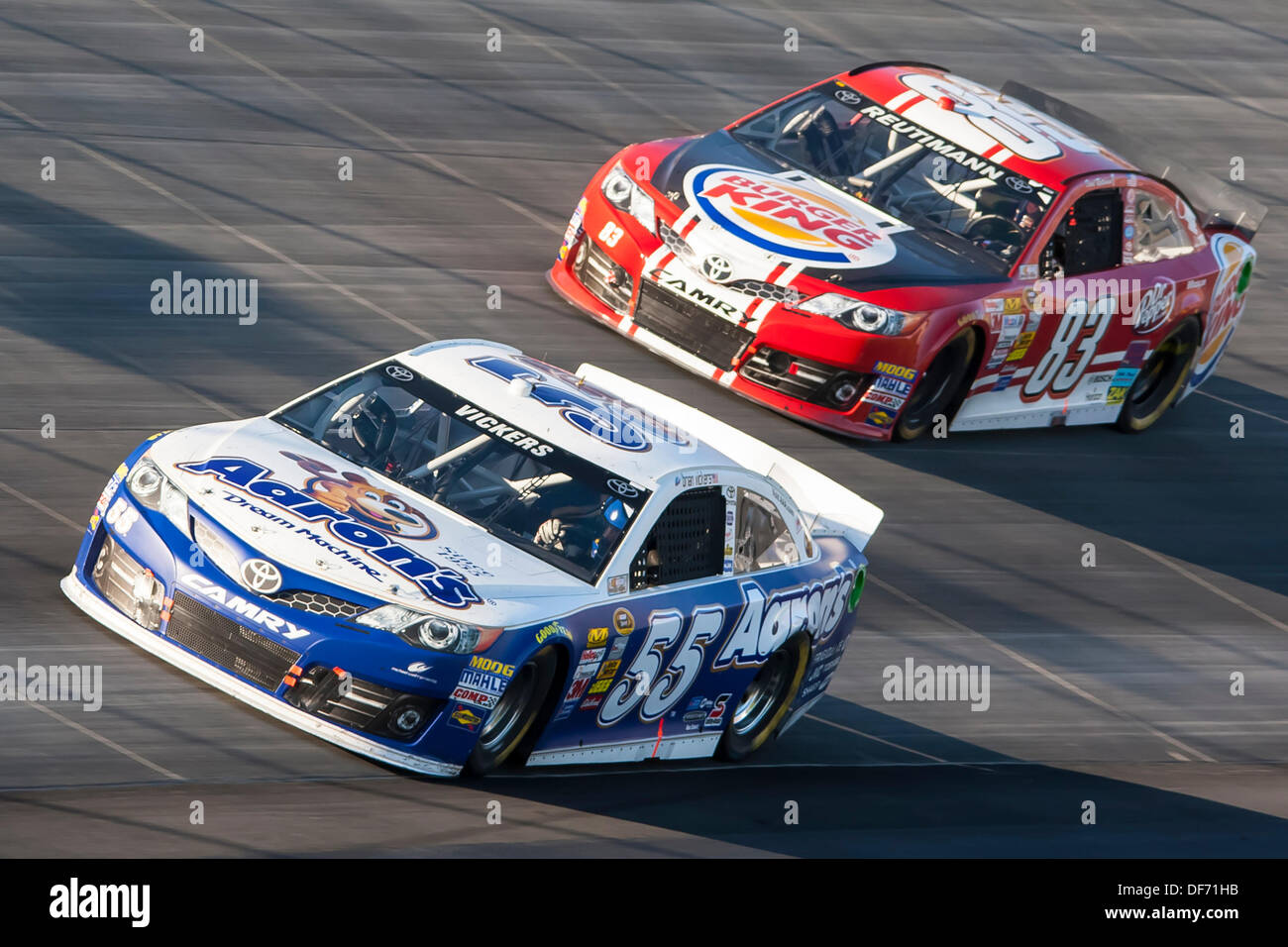 Dover, DE, USA. 29th Sep, 2013. Dover, DE - Sep 29, 2013: Brian Vickers (55) battles David Reutimann (83) during the AAA 400 at Dover International Speedway in Dover, DE. © csm/Alamy Live News Stock Photo