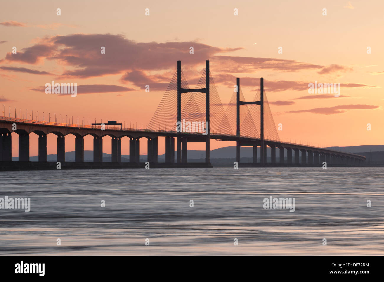 A colourful sunset over the Second Severn Crossing, carrying the M4 motorway, linking England and Wales. Stock Photo