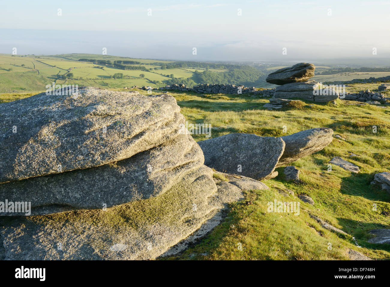 Rocky outcrops and logan stones on Belstone Common, Dartmoor, UK. Stock Photo