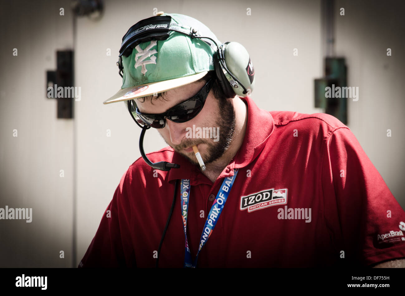 TV Engineer smoking in the pits at the Baltimore Grand Prix Stock Photo