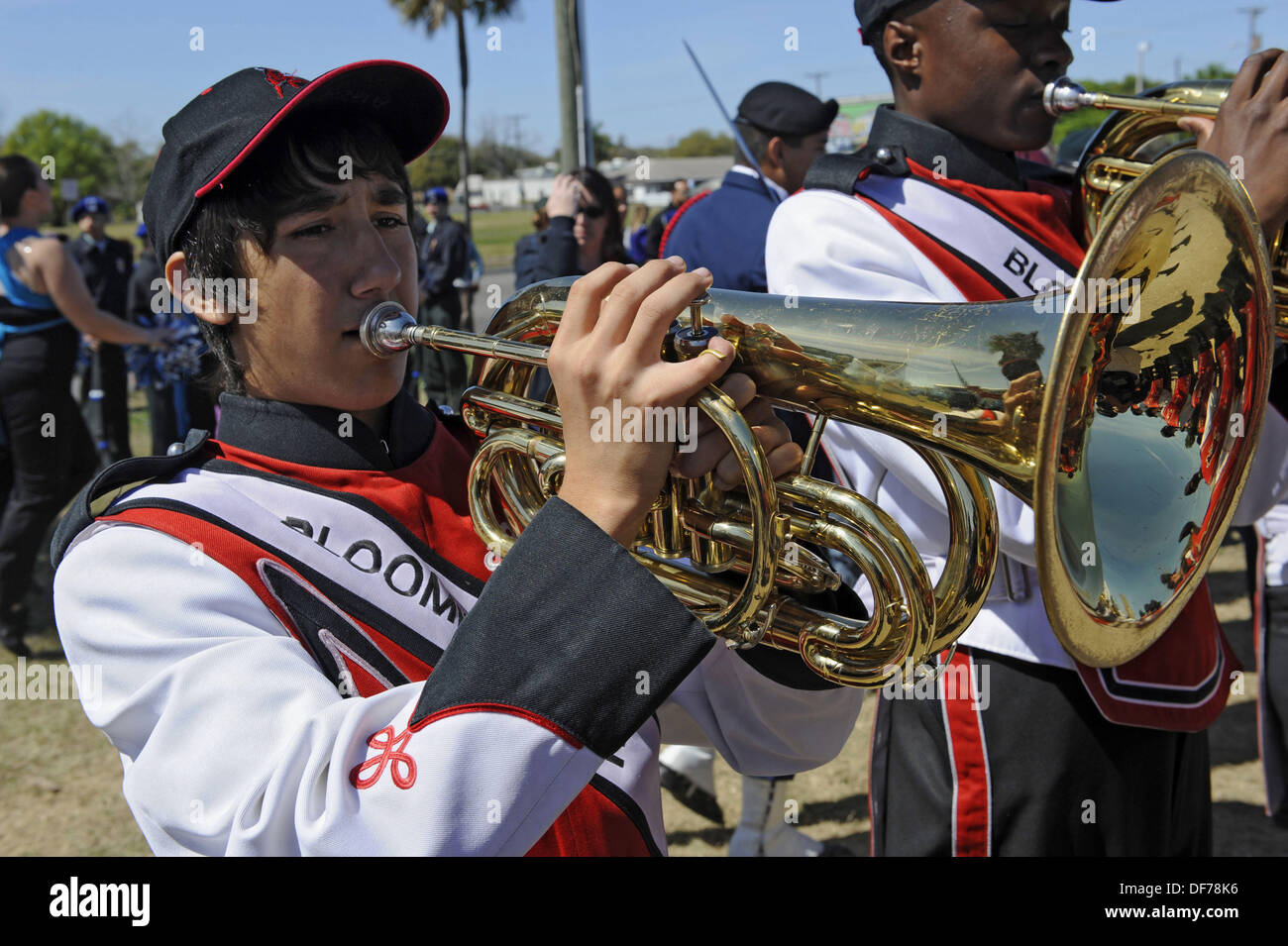 High School Band Member plays french horn at Strawberry Festival Parade