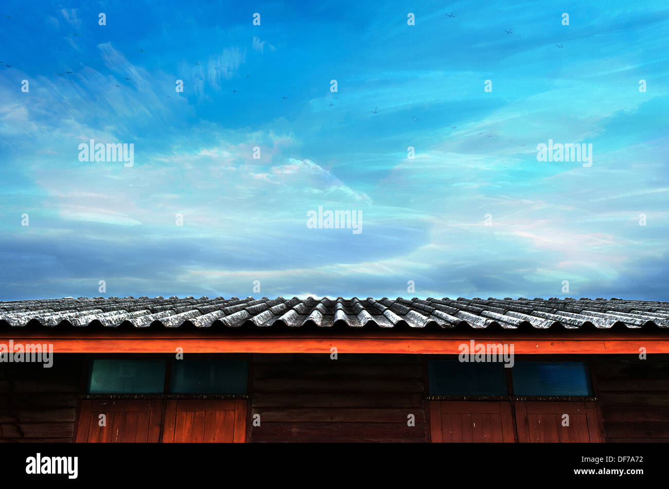 The Moving Planes, Cloudy Blue Sky and Roof of Wooden House Stock Photo ...