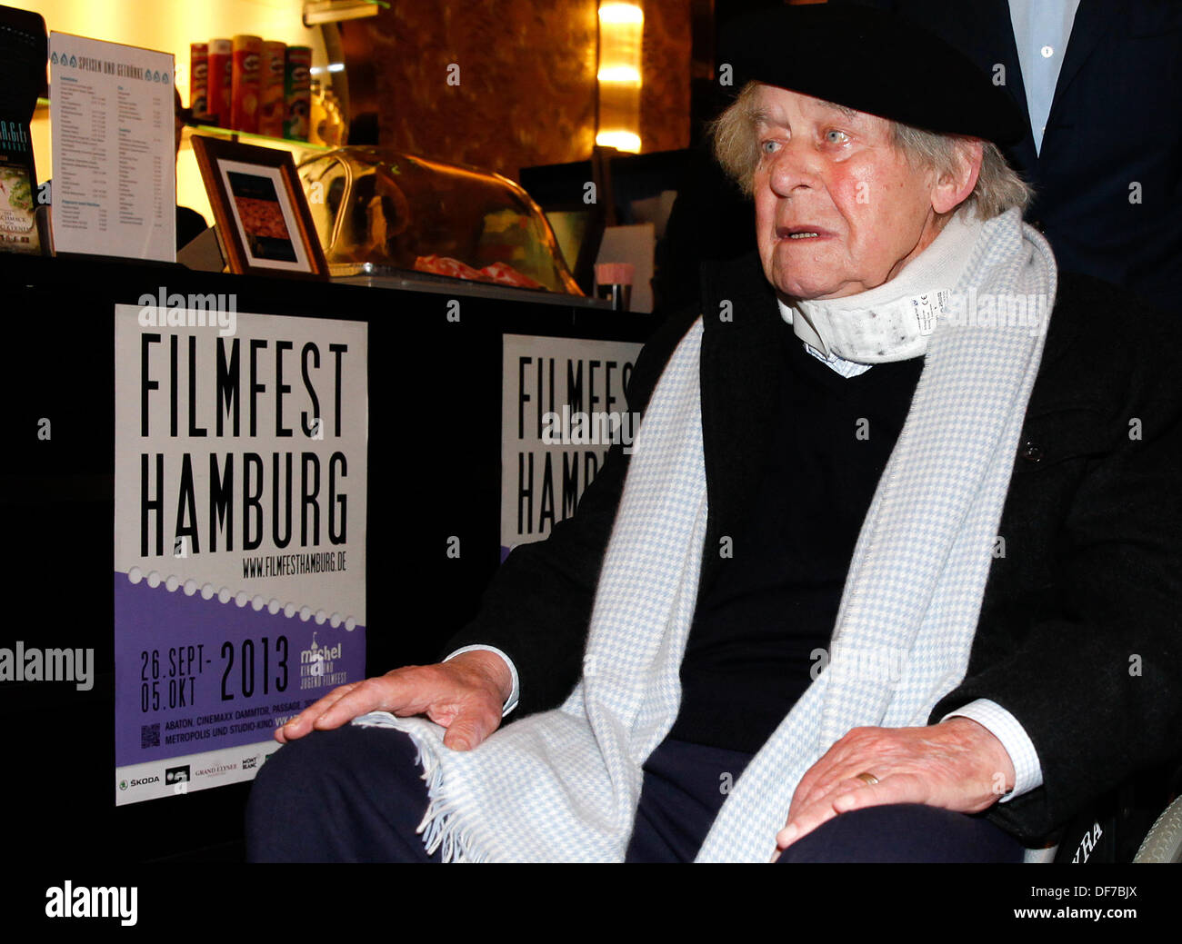 Hamburg, Germany. 28th Sep, 2013. Author Siegfried Lenz waits for the premiere of the movie 'Die Flut ist puenktlich' (lit: the flood is punctual) at the Passage-Kino in Hamburg, Germany, 28 September 2013. The film is based on the short story with the same name written by Siegfried Lenz. Photo: AXEL HEIMKEN/dpa/Alamy Live News Stock Photo