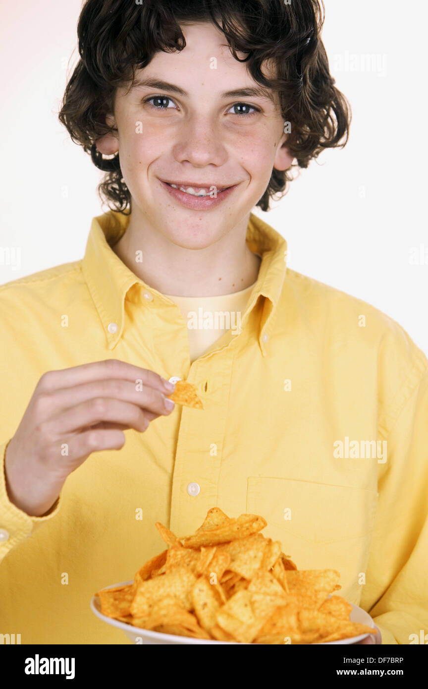 Child eating tortilla chip hires stock photography and images Alamy