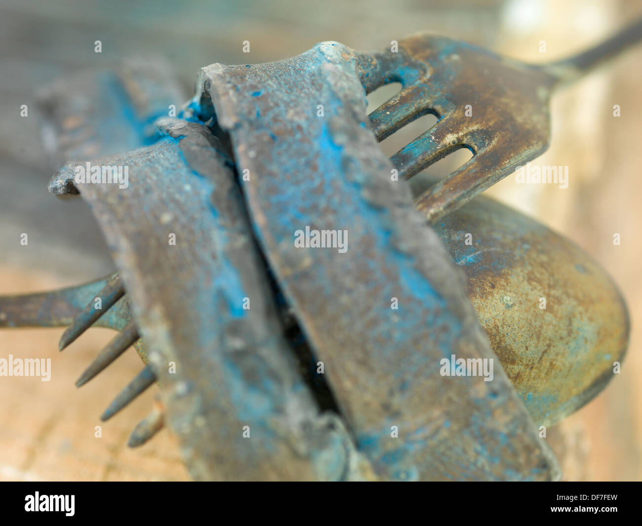 macro of a contemporary sculpture made out of rusty fork and pieces of metal Stock Photo