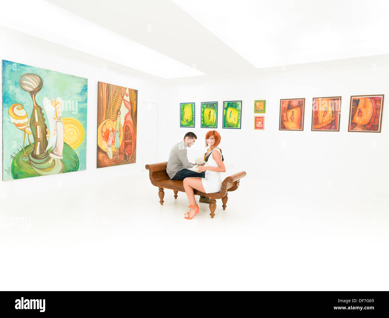 young couple sitting on a bench in art gallery, with colorful paintings