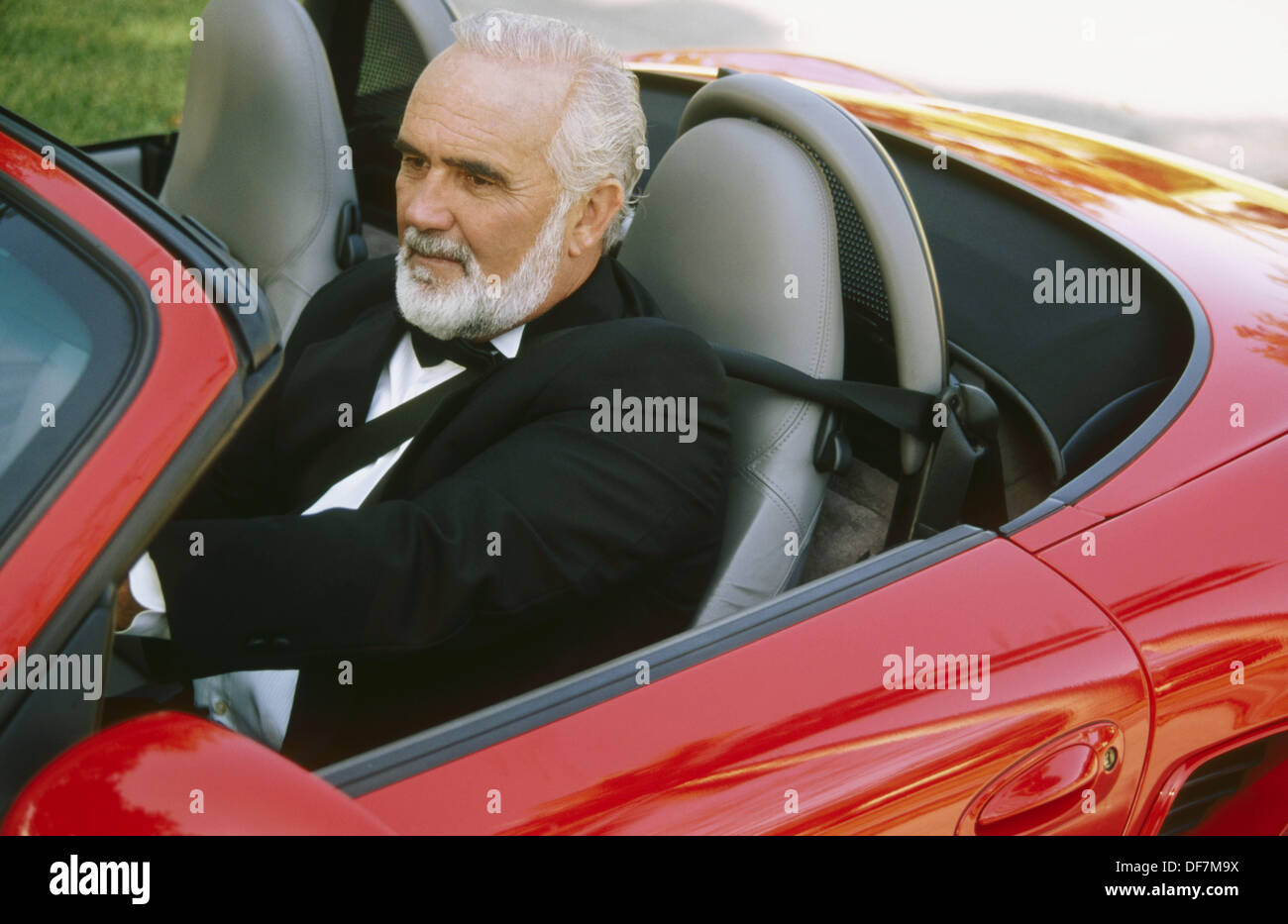 Senior man driving sports car hi-res stock photography and images - Alamy