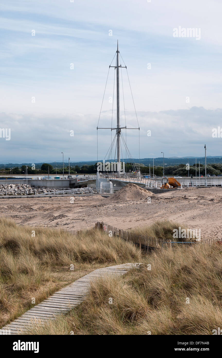 Kinmel Bay sand dunes Rhyl North Wales with Rhyl harbour cycle bridge