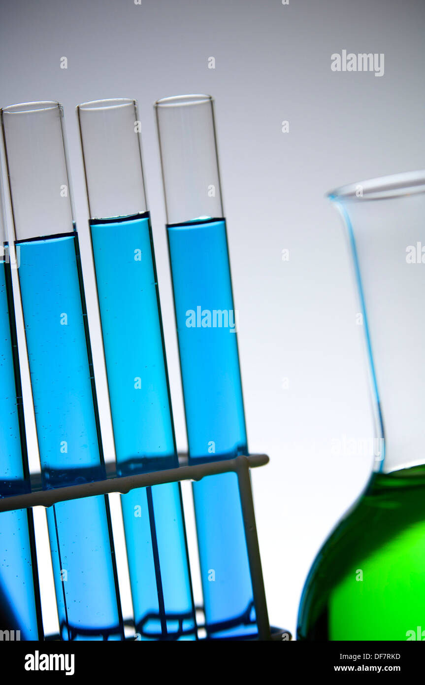 blue test tubes and bottle with white background Stock Photo