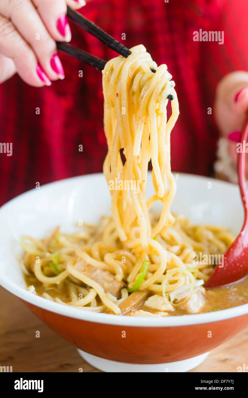ramen japanese food style pork onion sliced noodle eat with miso soup Stock Photo
