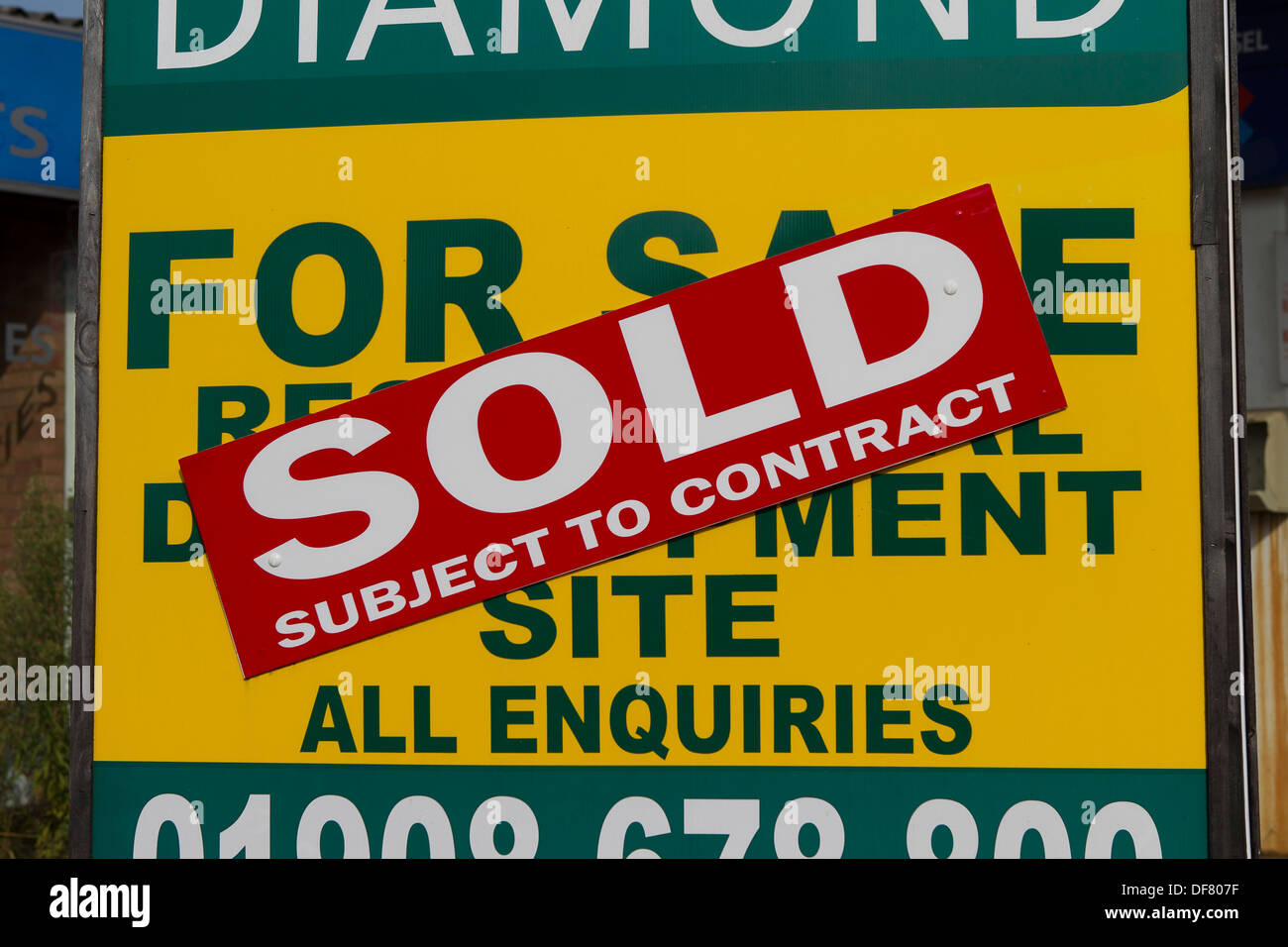 For Sale / Sold sign at a disused and derelict fuel station in Heath and Reach. Stock Photo