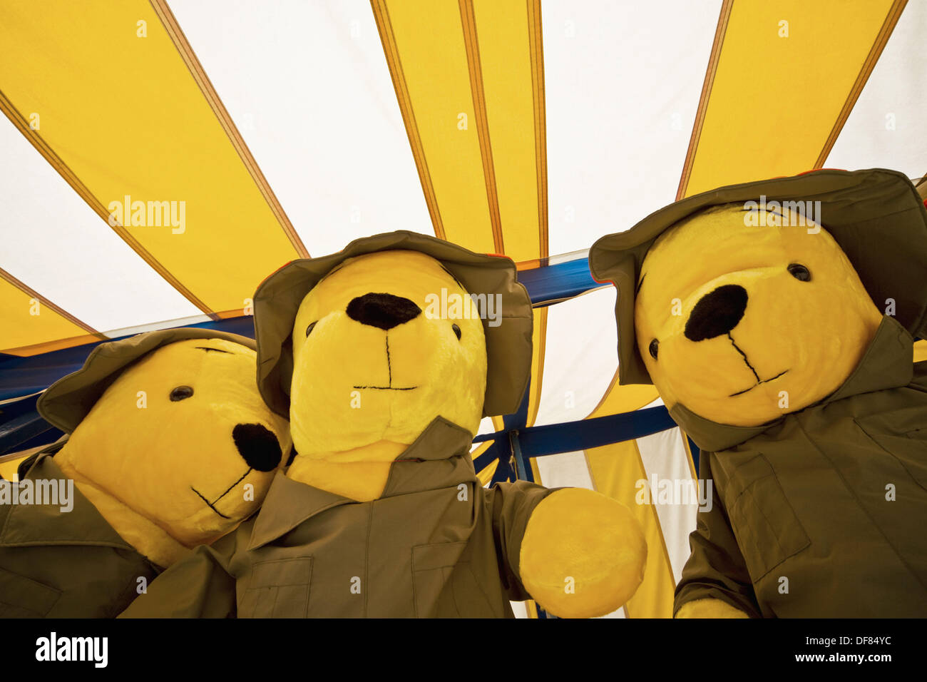 Stuffed animals hanging above a game at a carnival Stock Photo Alamy