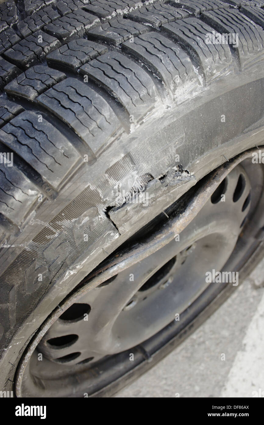 Broken tire, bursted tire Stock Photo Alamy