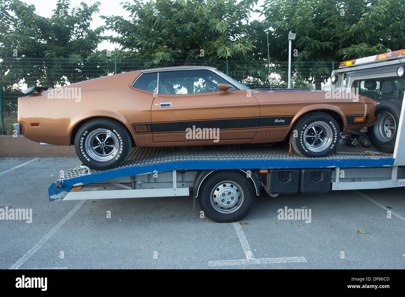 1970's brown  ford mustang mach 1 recovery truck Stock Photo