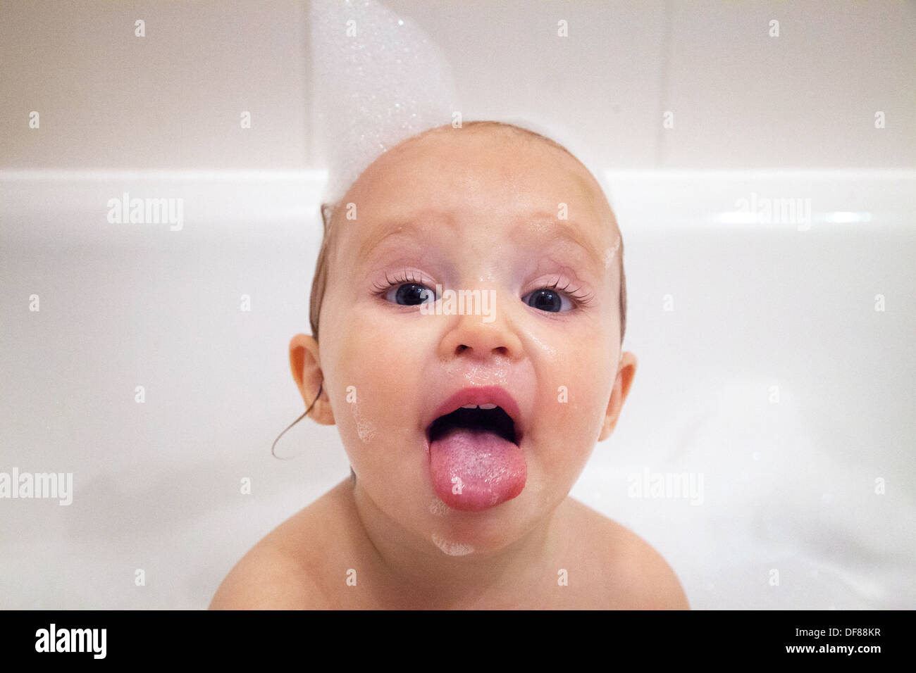 CHILD TAKING A BATH Stock Photo Alamy