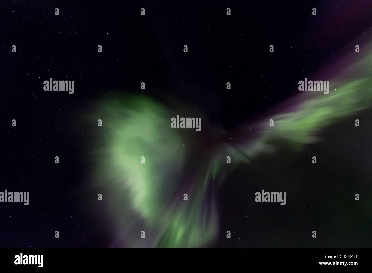 Aurora borealis or northern lights moving across night sky within the ...