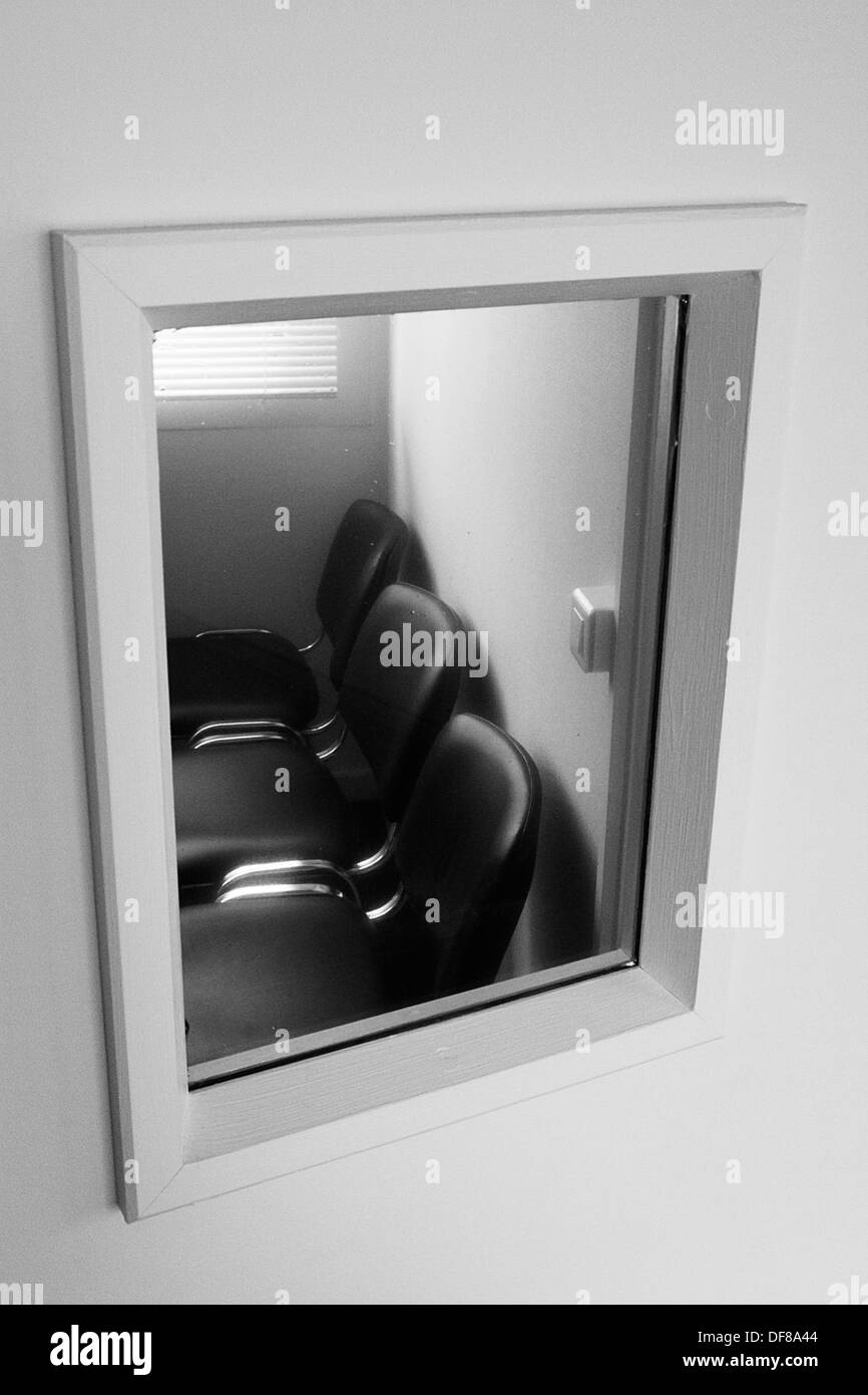 Empty chairs in empty room Black and White Stock Photos & Images - Alamy