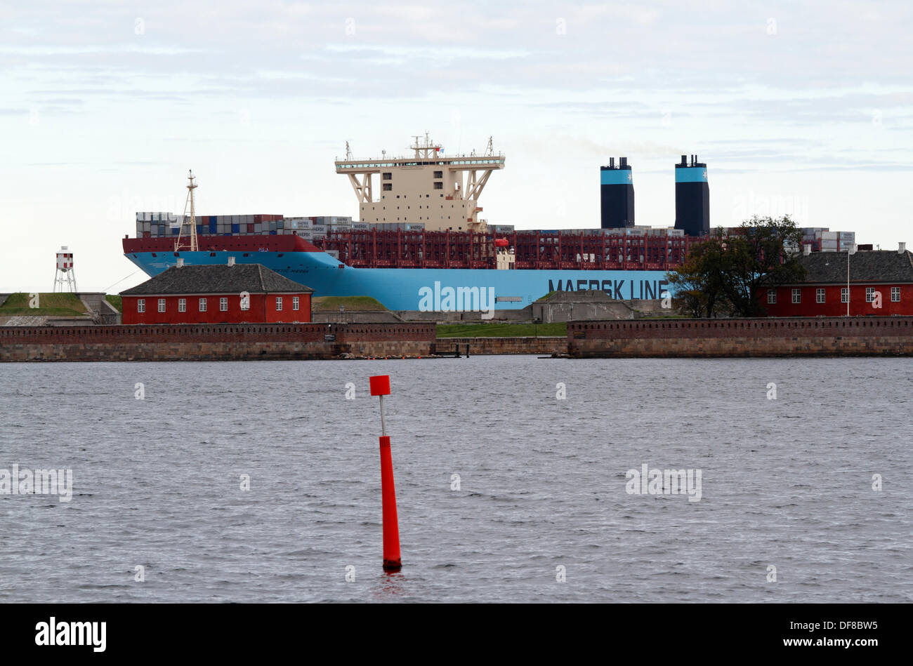 Copenhagen, Denmark. 30th Sep, 2013. The Majestic Maersk left the Langelinie quay in Copenhagen after one week's official naming ceremony and presentation to Maersk relations and the Danish public. Majestic Maersk, now heading for Gothenburg in Sweden to enter the container service between Europe and Asia, will probably never visit Copenhagen again as it is off-route and not suitable for this size of ship. By help of own propellers and four Svitzer tugs the ship was backed out of the harbour, as it is too shallow and small for a triple-E class ship to turn. Credit:  Niels Quist/Alamy Live News Stock Photo