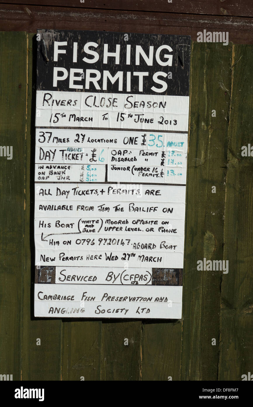 Sign fishing permit information Stock Photo
