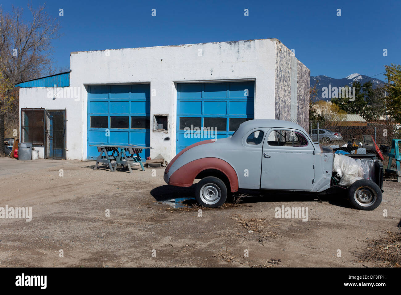 Old garage and car in Taos, New Mexico. Stock Photo