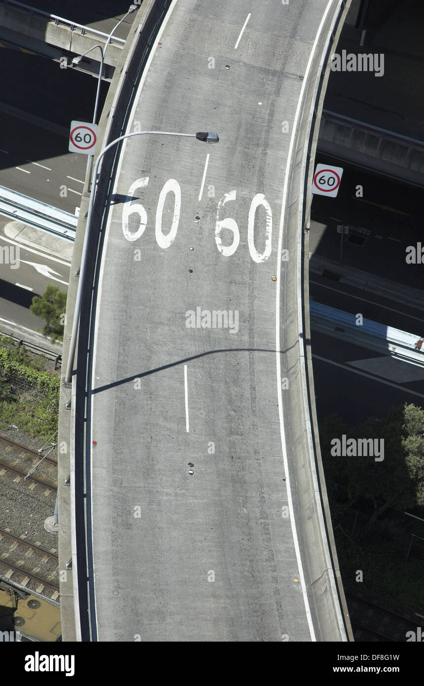 Urban road flyover with speed restriction signs Stock Photo