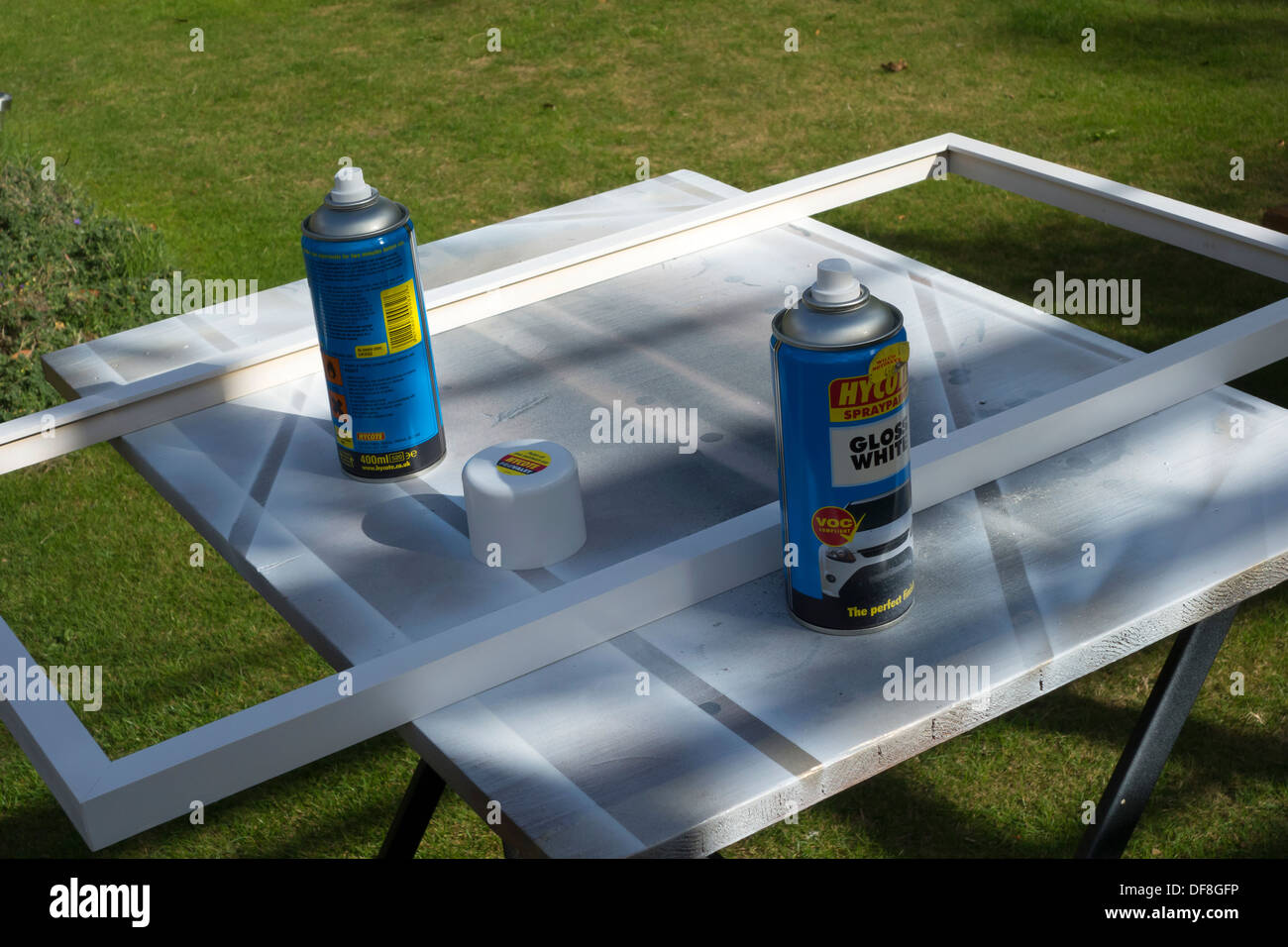 Spray painting wood frame Stock Photo Alamy