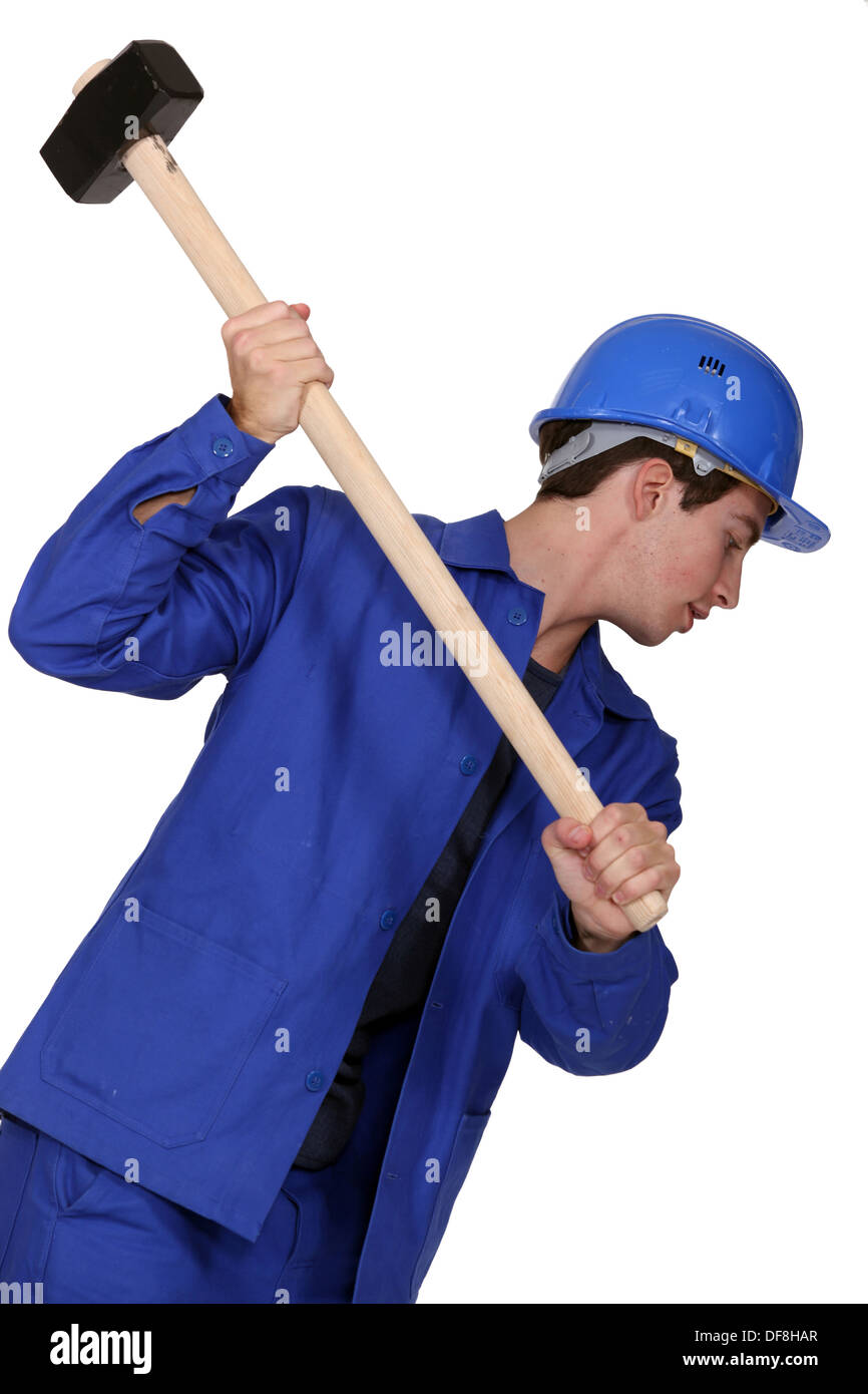 Man holding sledgehammer Stock Photo Alamy