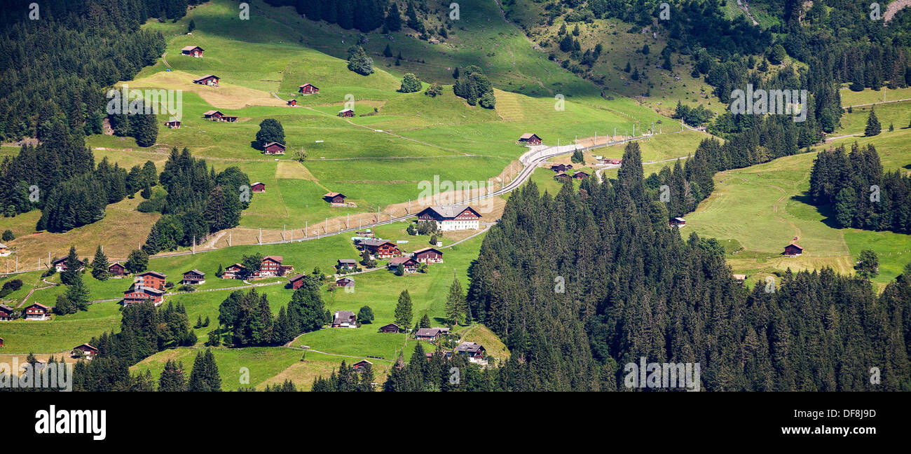 A Swiss farms at mountains Stock Photo
