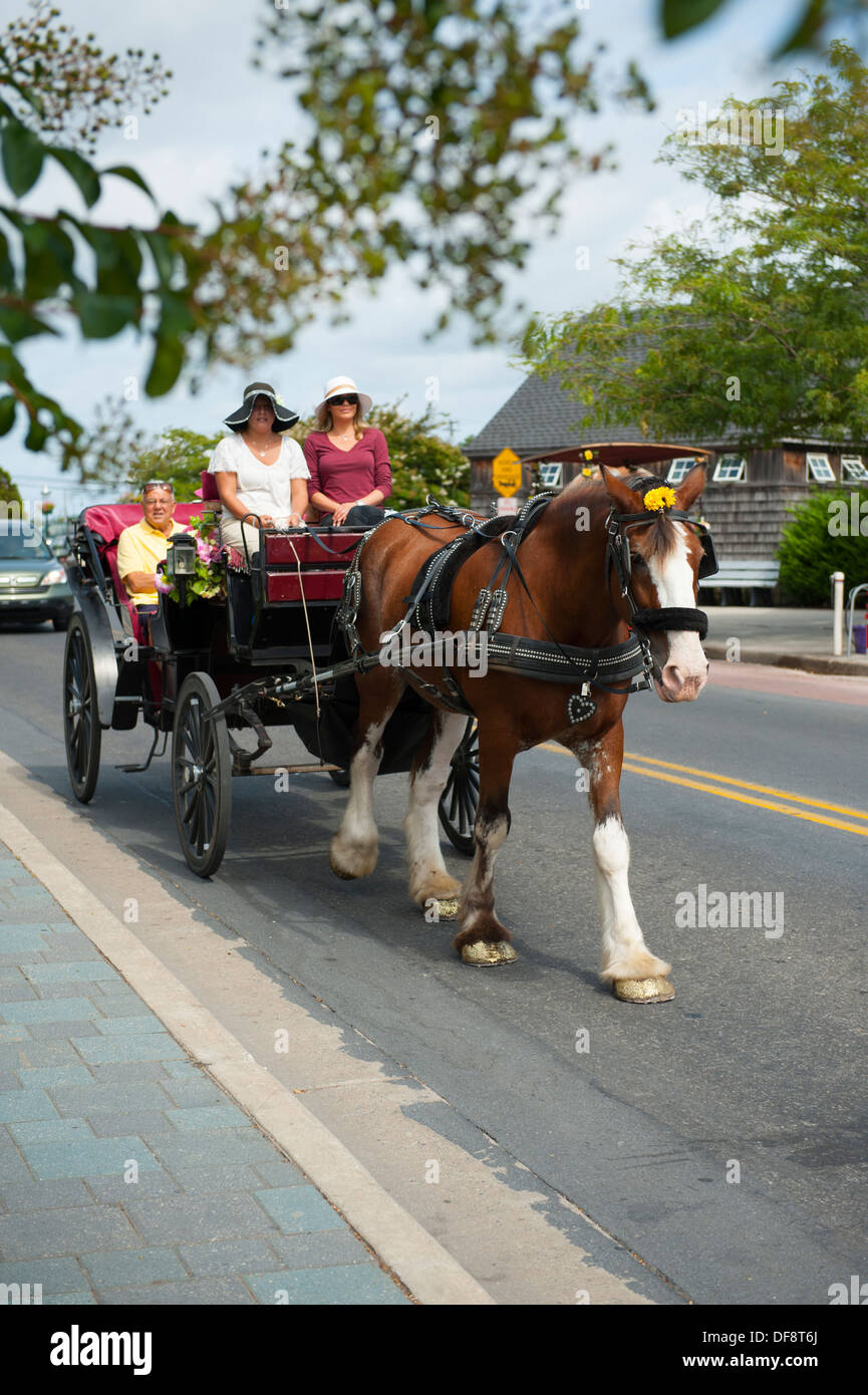 USA, New Jersey NJ N.J. Cape May  Horse drawn carriage rides through the historic beach resort town Stock Photo