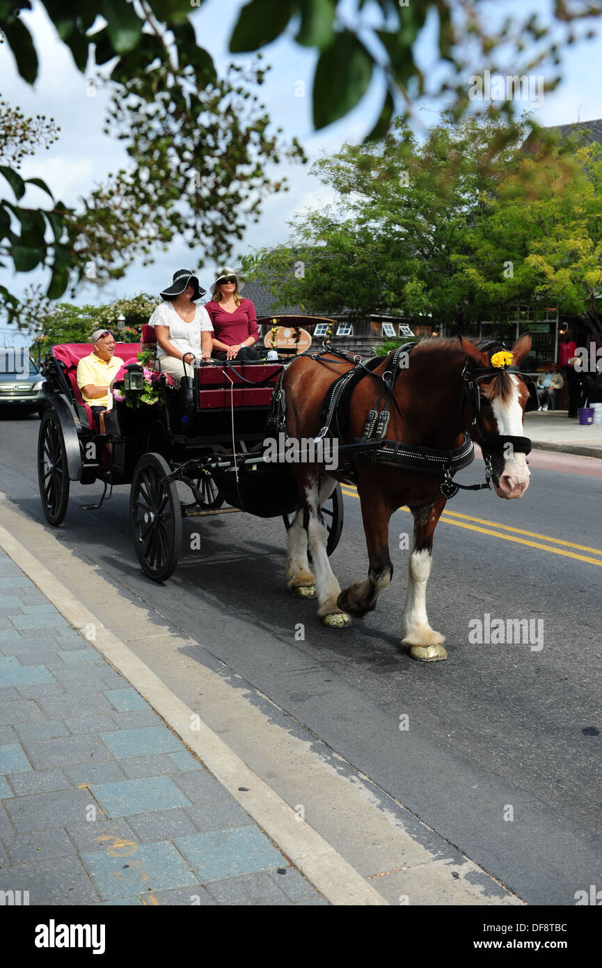 USA, New Jersey NJ N.J. Cape May  Horse drawn carriage rides through the historic beach resort town Stock Photo