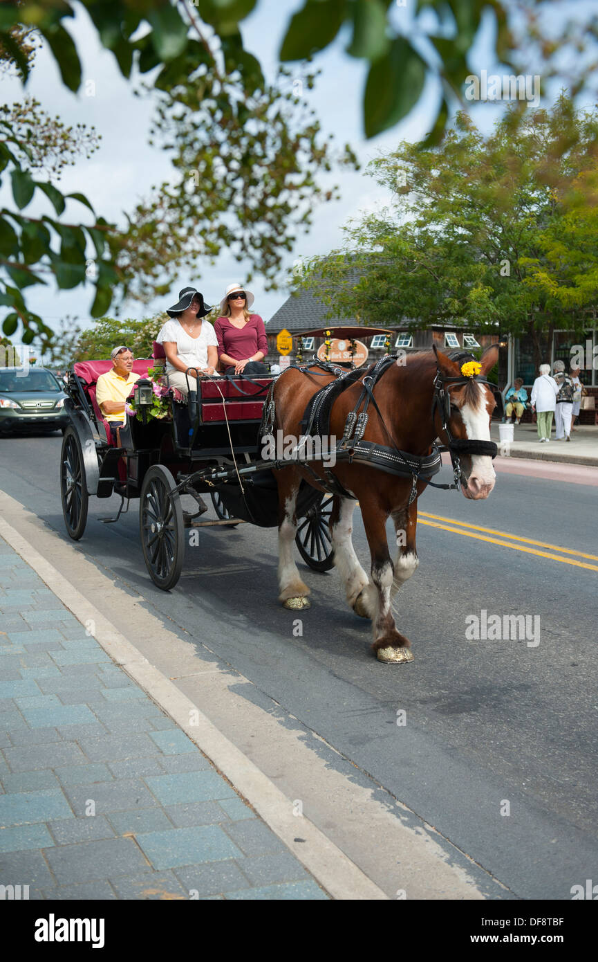 USA, New Jersey NJ N.J. Cape May  Horse drawn carriage rides through the historic beach resort town Stock Photo