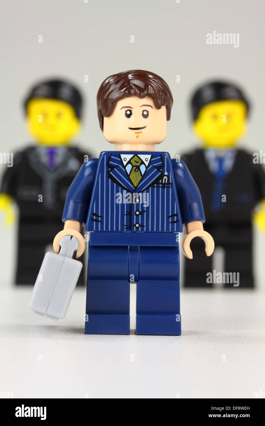 Lego businessman ahead of others Stock Photo