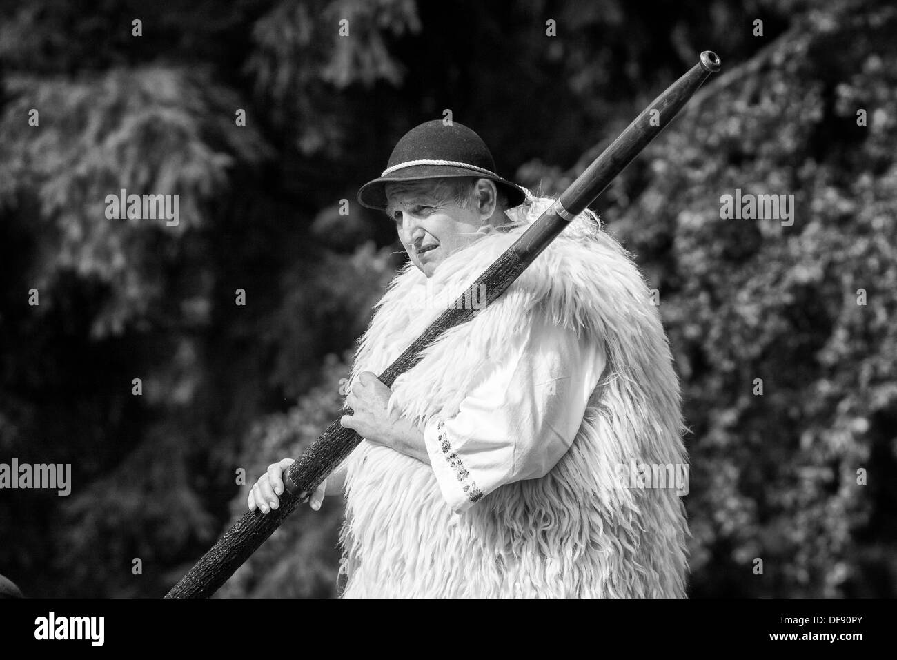 Man in sheep folk clothes Stock Photo