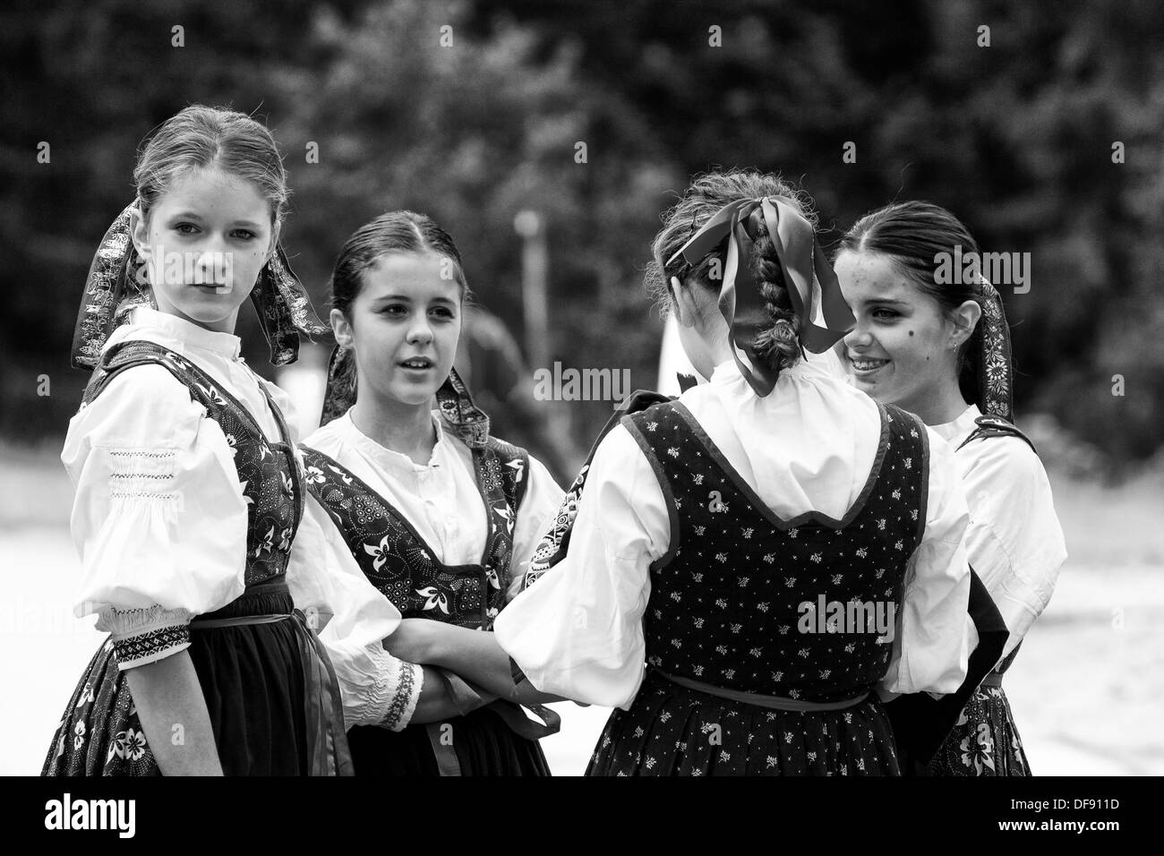 Girls in folklore costume before dancing performance Stock Photo