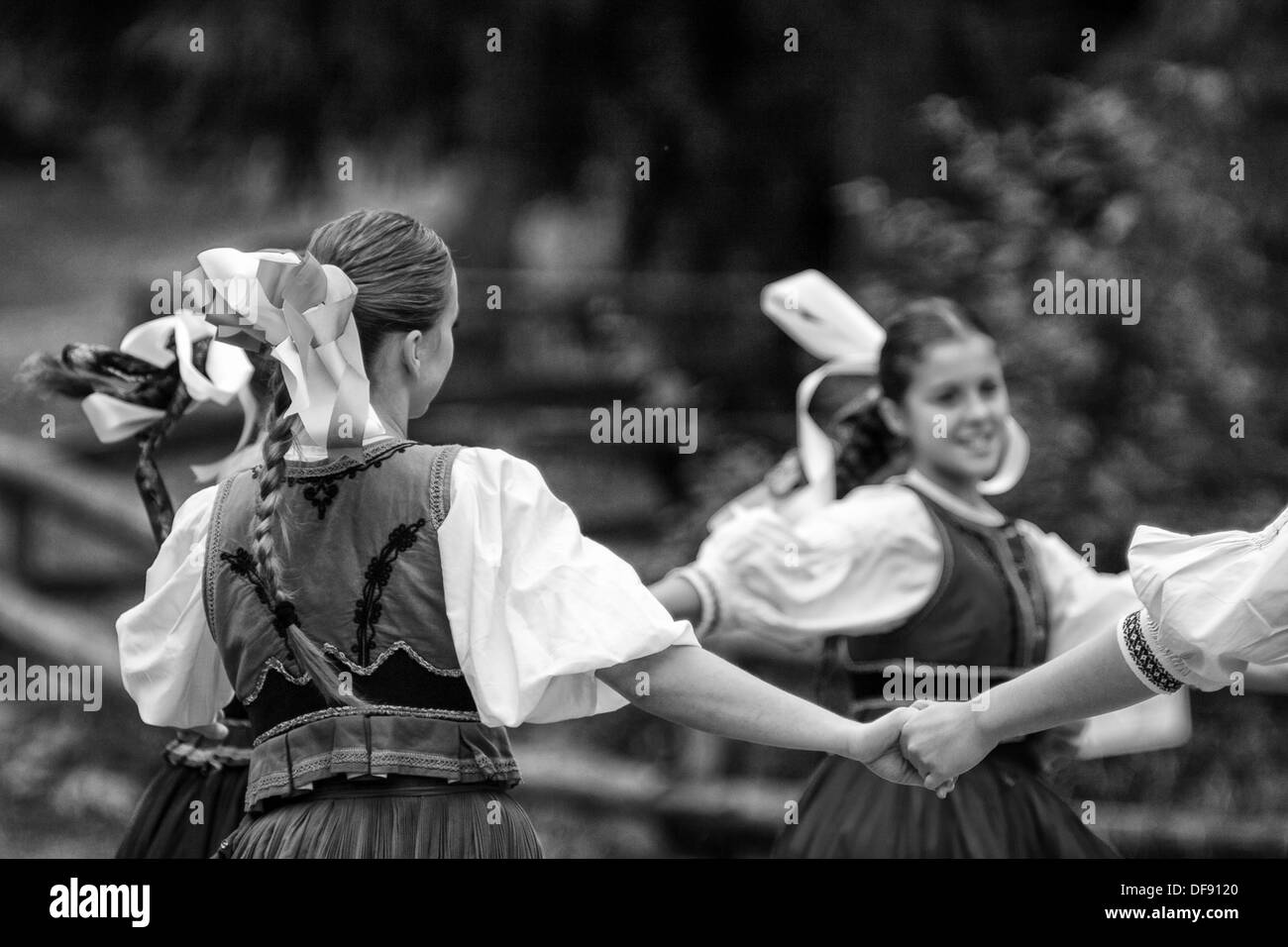 Girls with hair ribbon  in dancing action Stock Photo