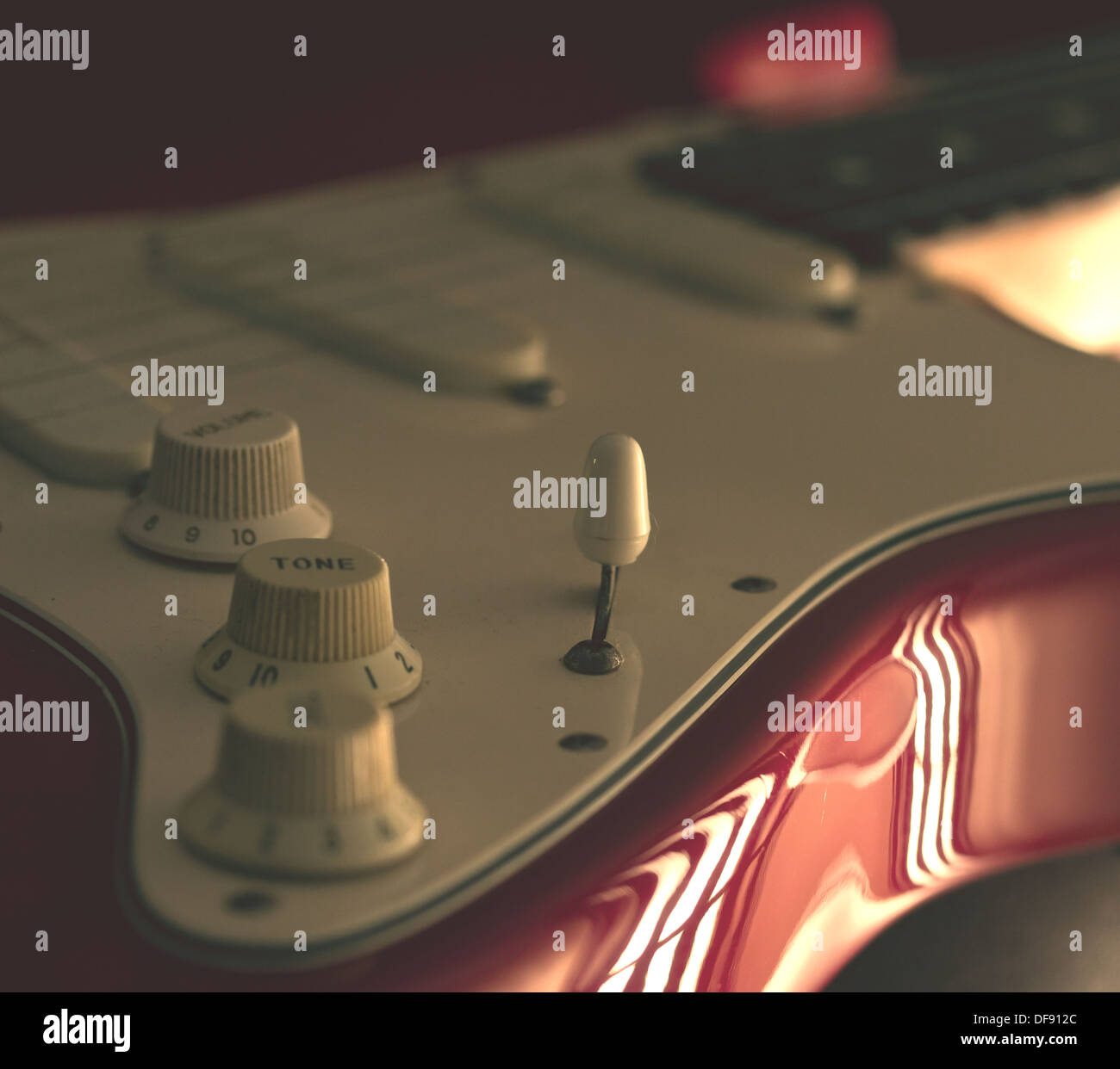 A macro shot of a Fender Stratocaster guitar. Stock Photo