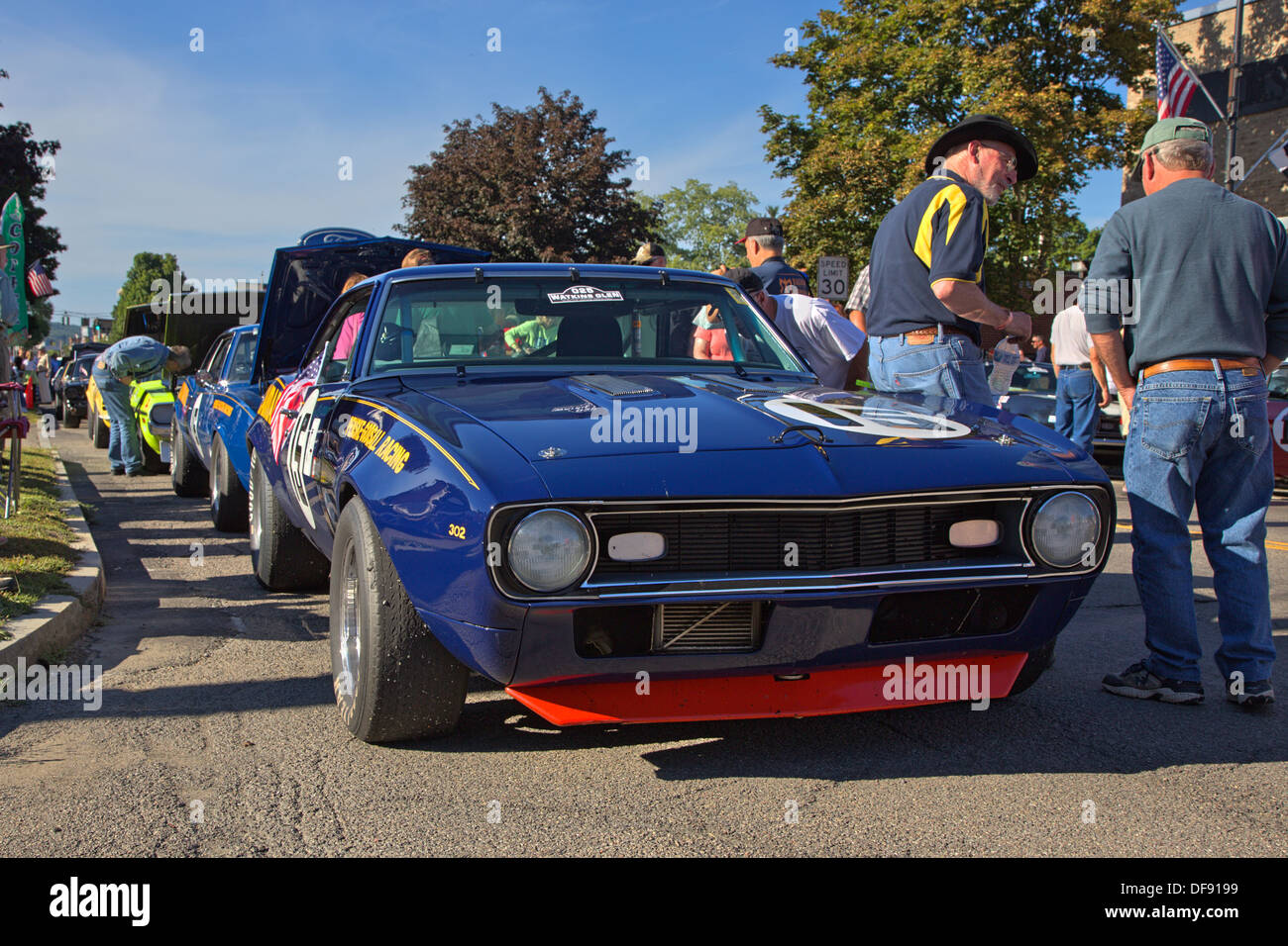 Vintage race cars parked in downtown Watkins Glen during the annual