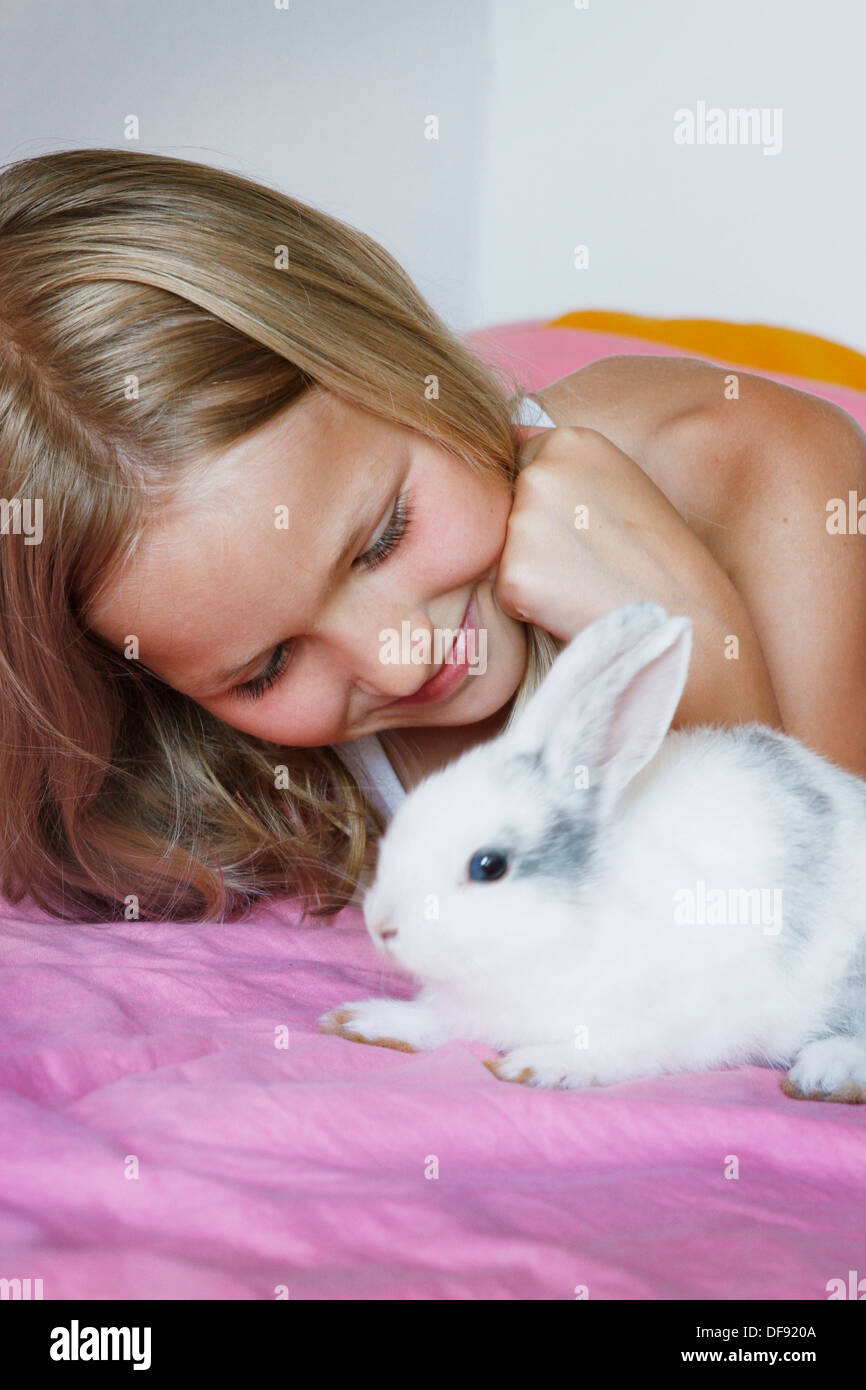 CHILD WITH ANIMAL Stock Photo