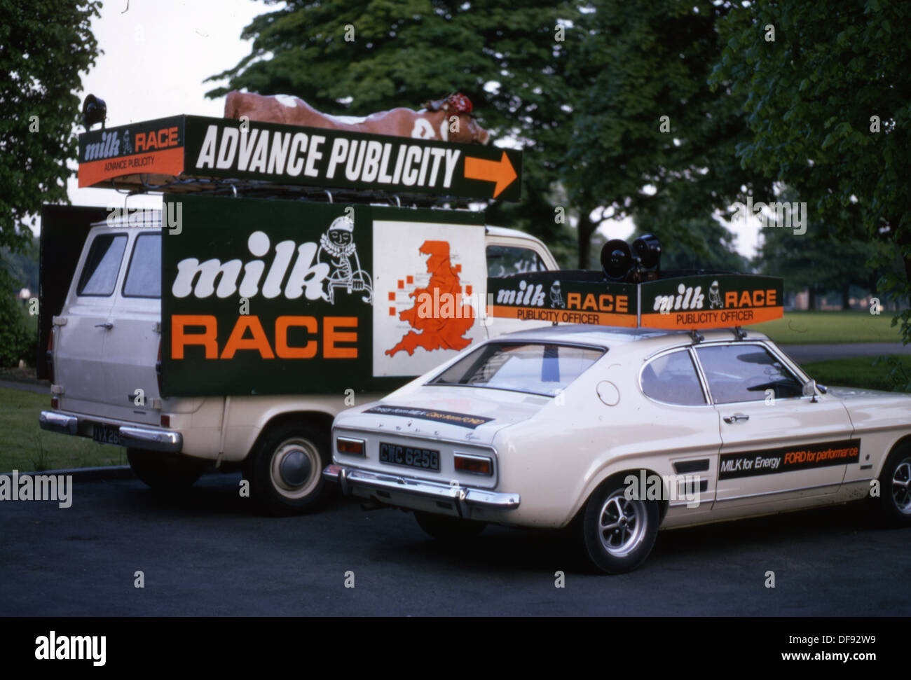 1980, picture of two advance publicity vehicles for the British nationwide road cycling event, The Milk Race, a famous event first started in 1958. Stock Photo