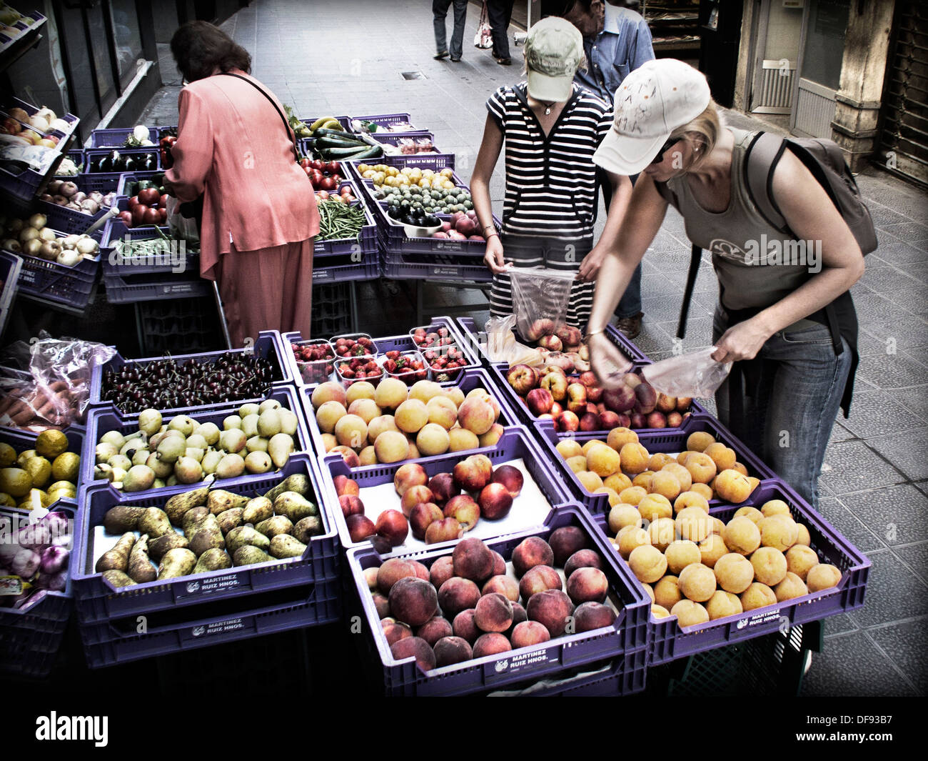 Outside grocery store holding apple hi-res stock photography and images ...