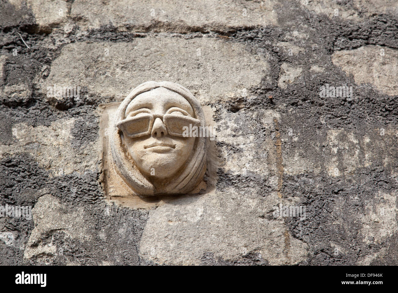 A stone face from The Great Wall of Walcot project, Walcot Street, Bath, England Stock Photo