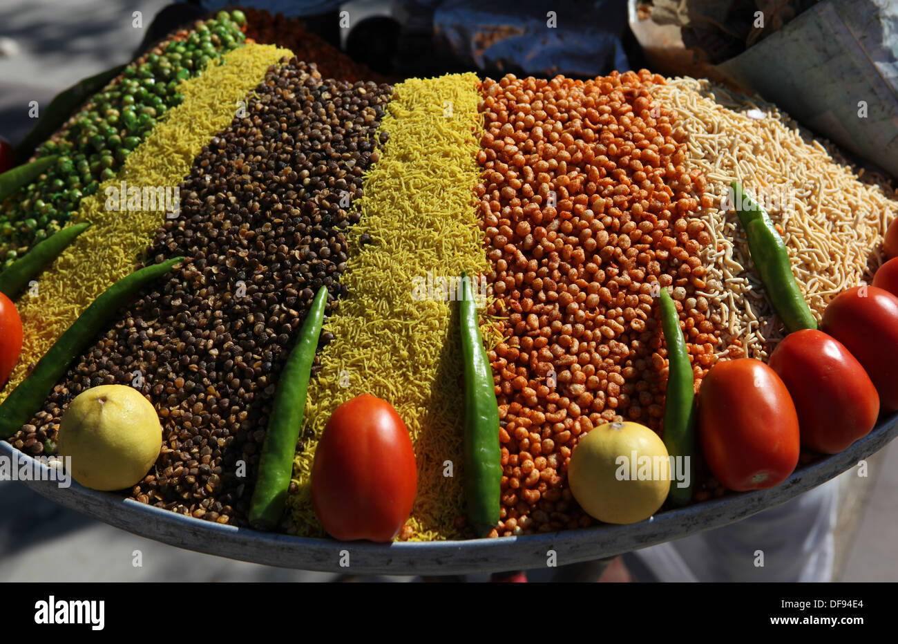 Big bowl with colourful foodstuff and spices in Jaipur, Rajasthan,India Stock Photo