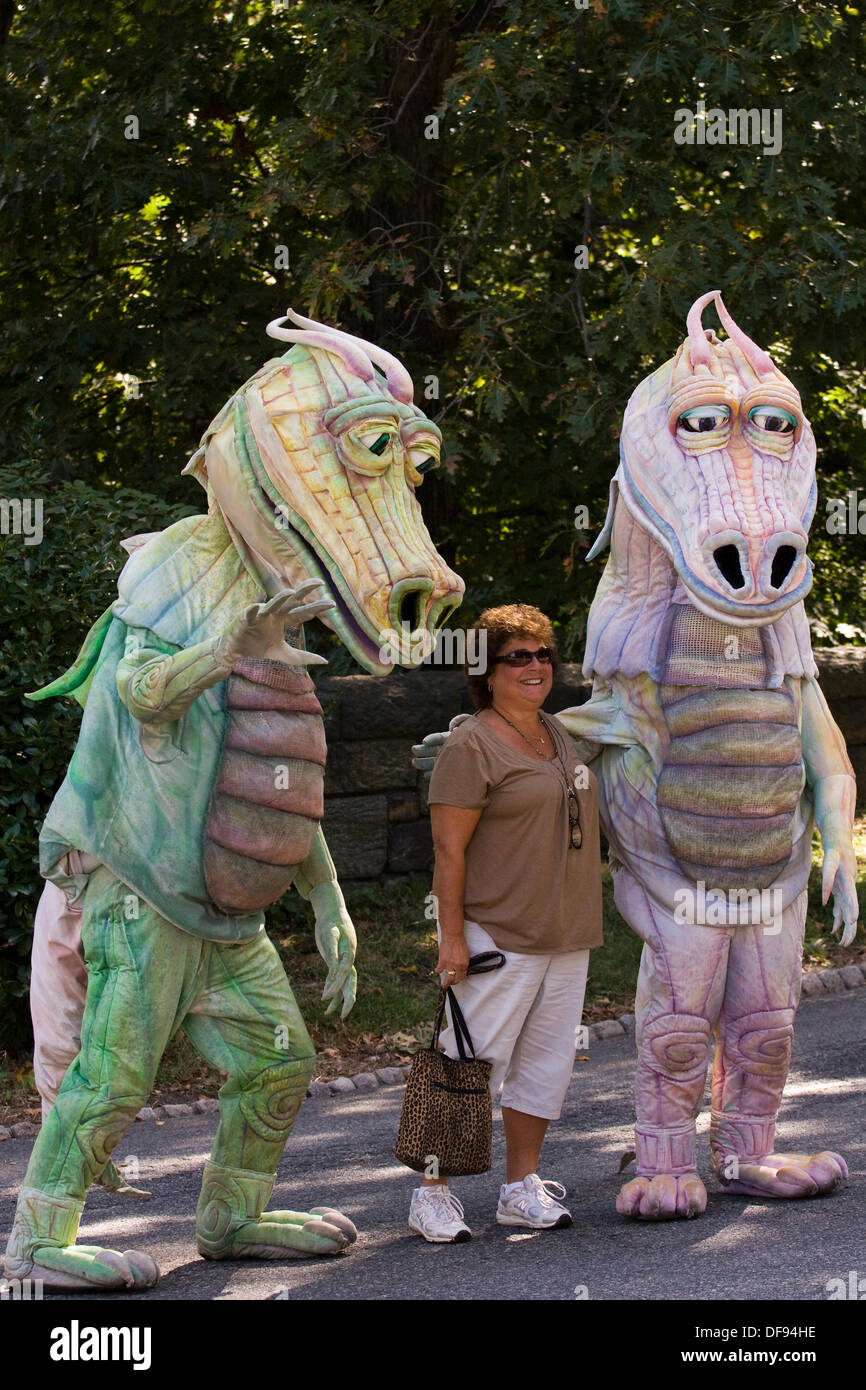 New York City USA Sept 29th 2013. Medieval Festival at Fort Tryon Park. Woman poses with two Dragons at the Medieval Festival at Fort Tryon Park in the Inwood neighborhood of NYC Credit:  Anthony Pleva/Alamy Live News Stock Photo