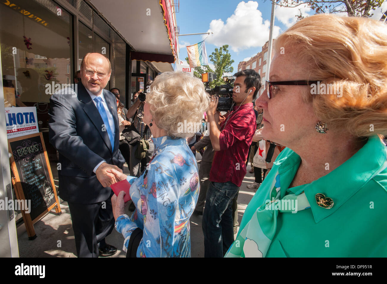 Republican Mayoral candidate Joe Lhota visiting small businesses and campaigning in Jackson Heights in Queens in New York Stock Photo